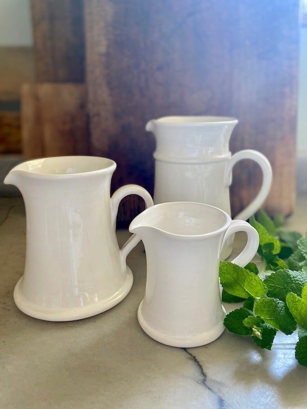 three antique ceramic jugs