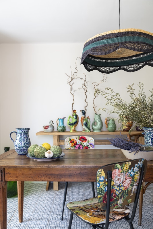 Colorful table, chair and antique French vases - French Spring Interior Inspiration