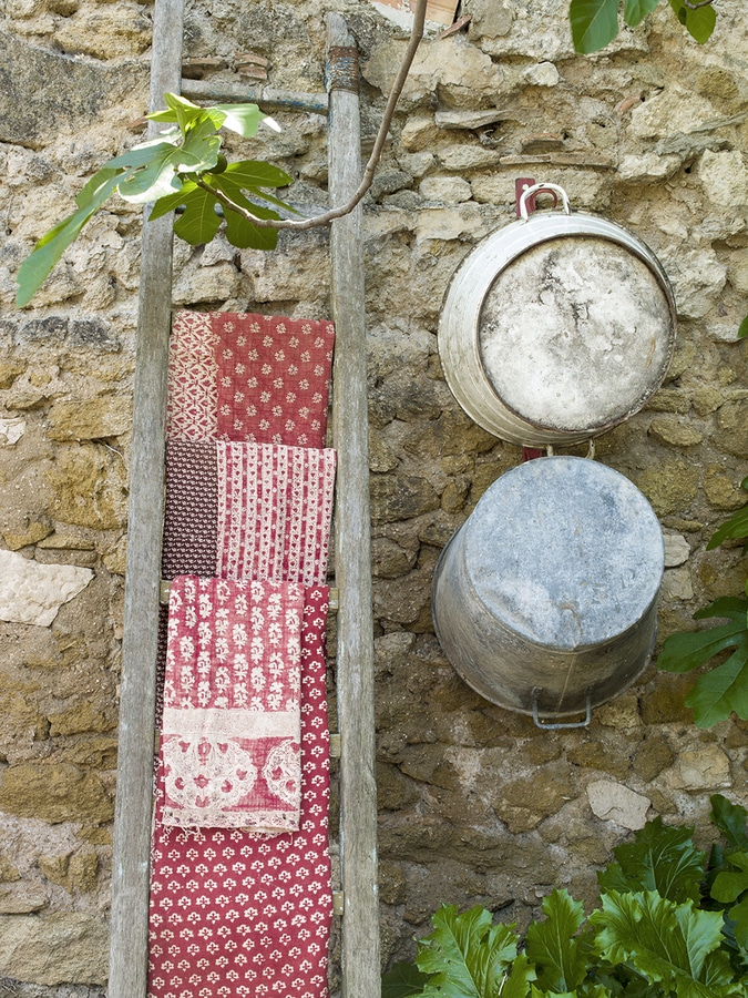 Red Provence French Fabrics on cane ladder
