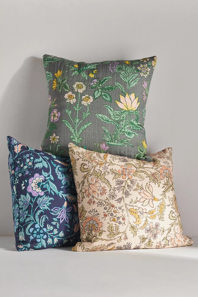 three floral pillows