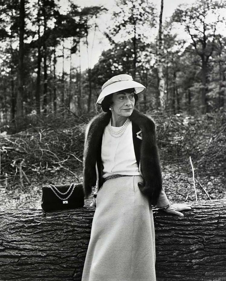 gabrielle "coco" chanel with her 2.55 bag